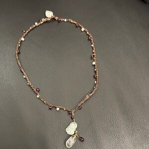 Elegant Beaded Necklace with Gold and Brown Accents